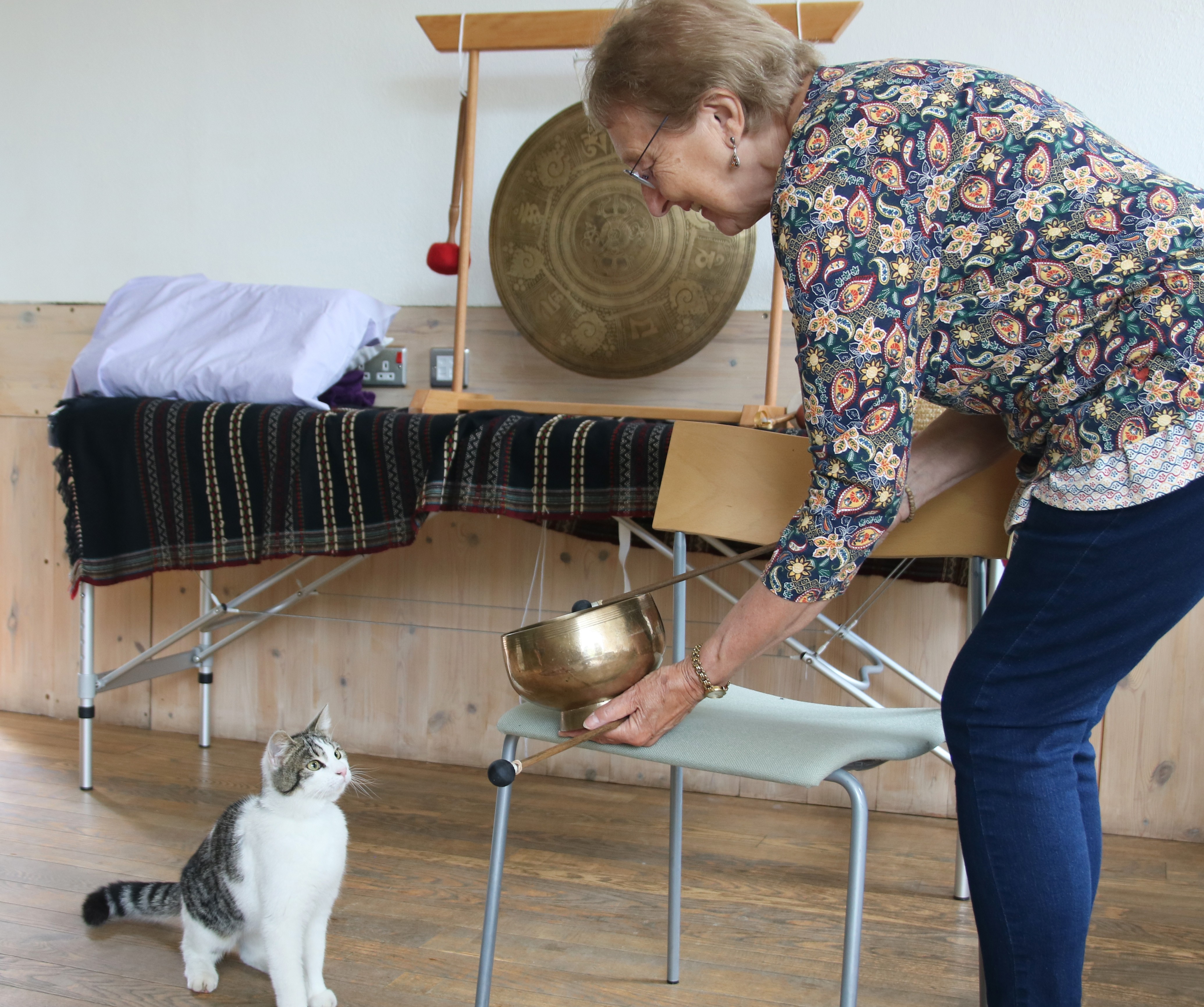 Maggie playing a sound bowl