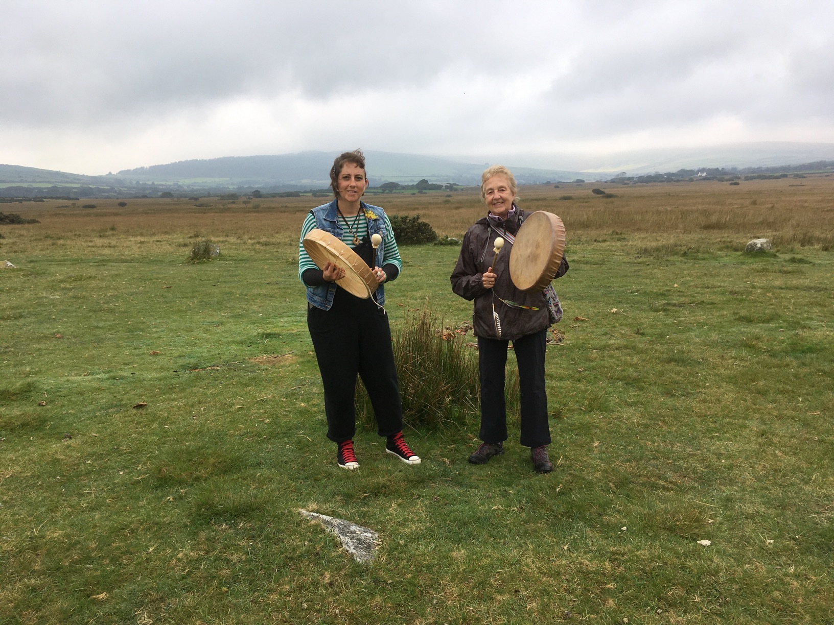 Maggie holding drums with client