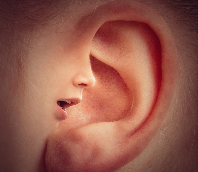 Voice whispering into ear